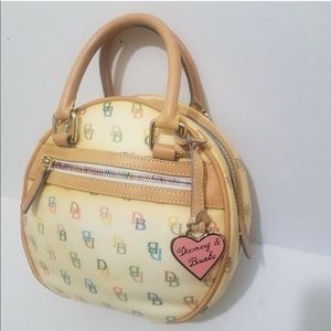 Looking for Dooney & Burke white circular backpack